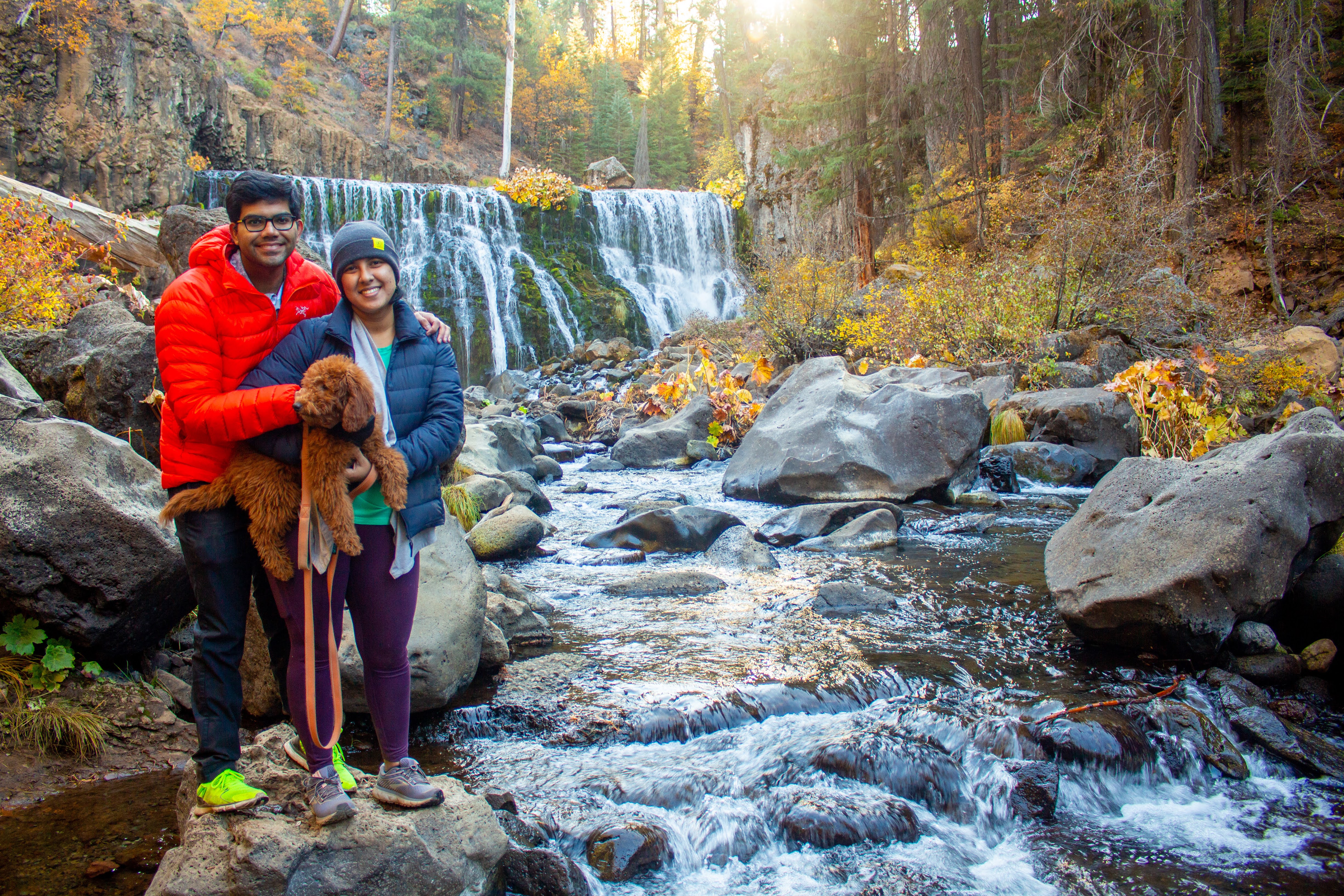 A picture of Sanchit & Harini with Gobi at McCloud Falls